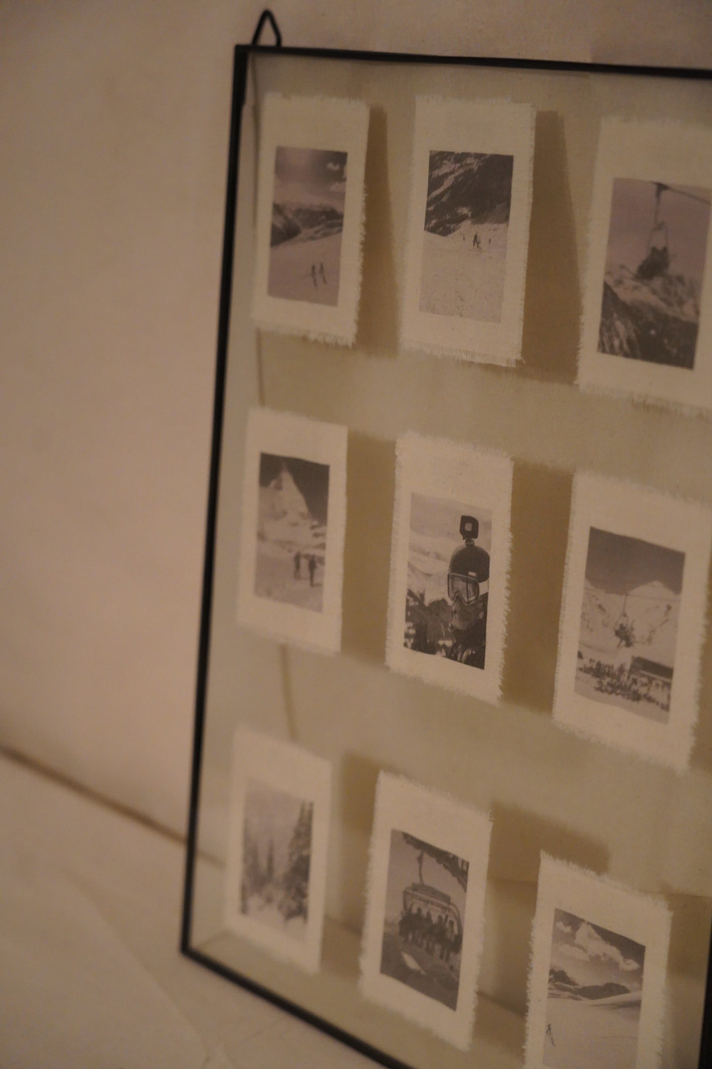 9 revelados en marco de cristal