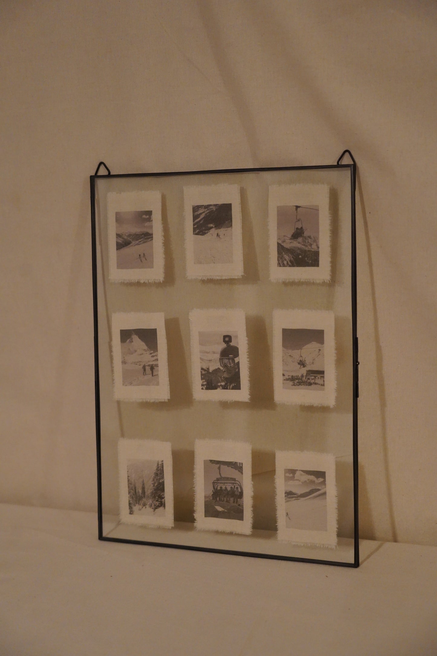 9 revelados en marco de cristal